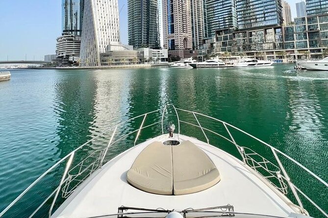2-Hour Dubai Sea Escape, Swim, Tan & Sightseeing - Music, Wi-Fi, and Onboard Drinks That Keep Things Easy