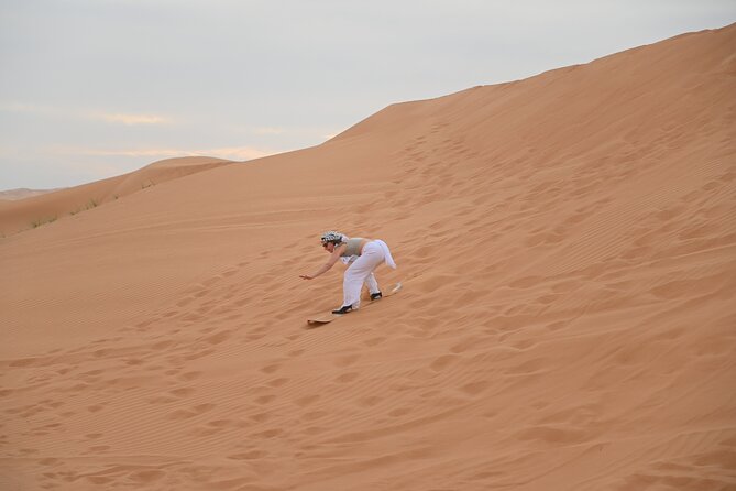 4 Hour Morning Desert Safari with Camel Ride & Sand Boarding - Sandboarding on High Red Dunes, The Learning Curve Is Short
