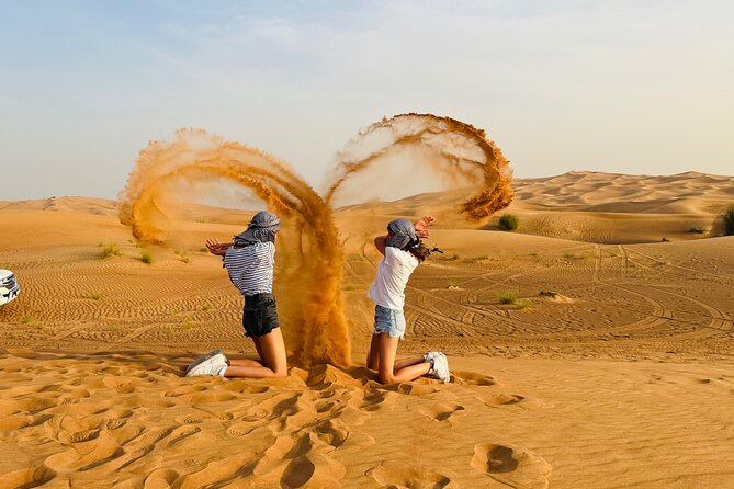 4x4 off-Road Desert Safari, Sandboarding, CamelRide, Veg & BBQ - Stop 2: Al Lahbab high red dunes for dune bashing, sandboarding, and a photo point