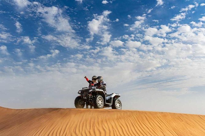 90-Minutes Quad Biking Tour From Dubai - Safety gear, helmets, and how the guide controls the fun