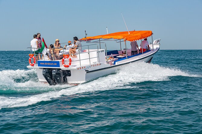 Abra Tours - Dubai Sightseeing Cruises - Comfort and onboard extras: bottled water, shower, and Bluetooth music