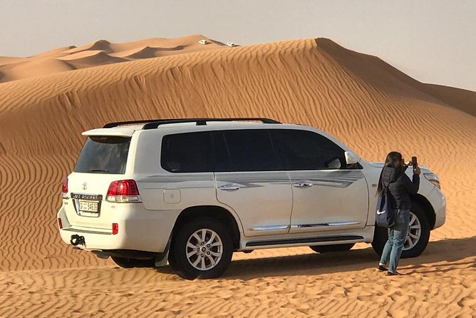 Abu Dhabi 4x4 Desert Safari BBQ Dinner , Camel Ride , Belly Dance - Falcons, sand, and the small “extras” that make it feel complete