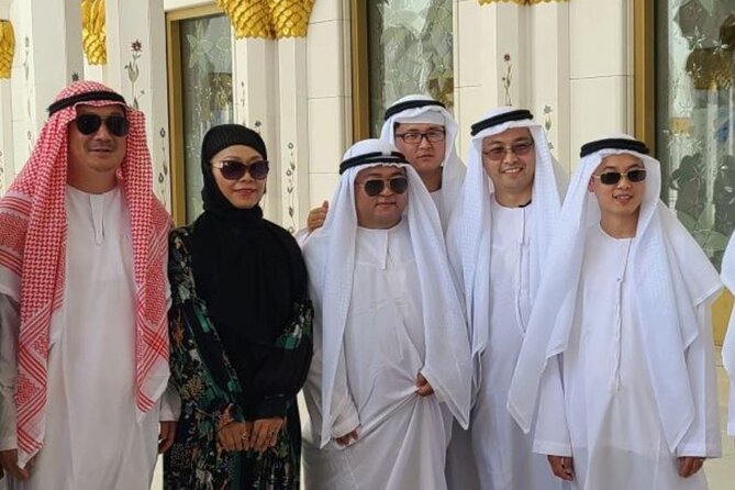 Abu Dhabi City Tour of Grand Mosque, Palace, Louvre, and Ferrari - Corniche Beach and Emirates Palace: short stops with big photo energy