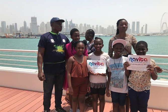 Abu Dhabi City Tour with Grand Mosque Including Transfers - Saadiyat Island and Ferrari World Yas Island: off-coast heritage and one iconic photo