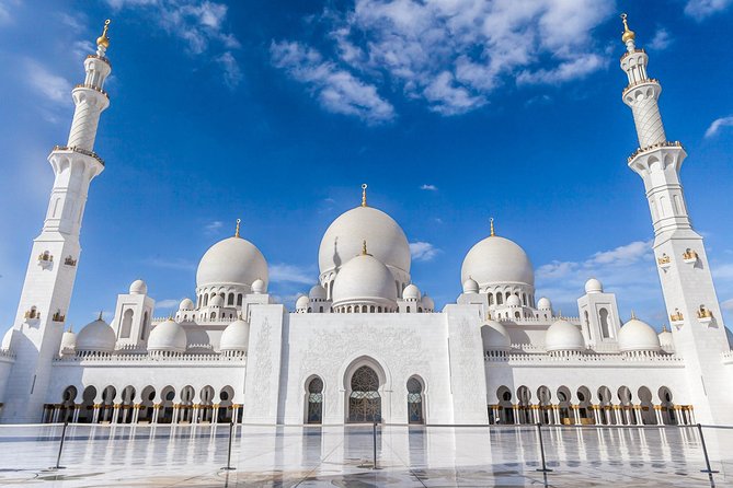Abu Dhabi City Tour with Louvre Museum from Dubai Small Group - Corniche Views, Emirates Palace Photos, and Al Bateen Drives