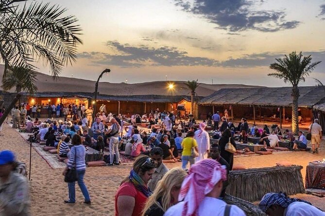 Abu Dhabi Desert Safari BBQ Dinner Live Shows Pick & Drop More - Camp comfort details: toilets, seating, and a henna artist in the flow