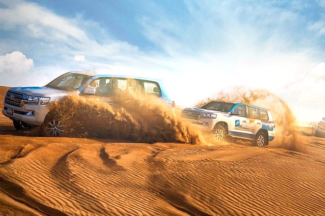 Abu Dhabi: Desert Safari with BBQ, Camel Ride & Sandboarding - Camp arrival: coffee, dates, henna, shisha, and dress photos