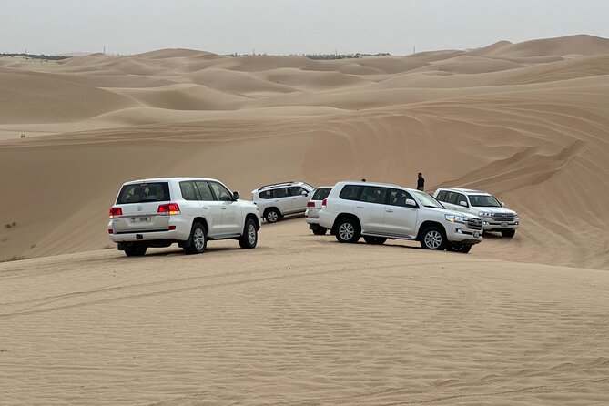 Abu Dhabi Desert Safari With BBQ Dinner & Live Shows - Getting to Al Khatim: Pickup, timing, and how the night starts