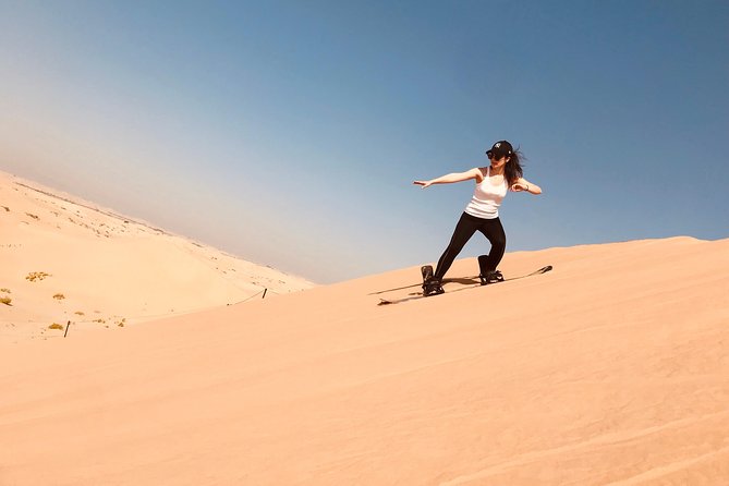 Abu Dhabi Desert safari with BBQ Dinner,Sandboarding & Camel ride - Getting to the dunes from Abu Dhabi, in comfort