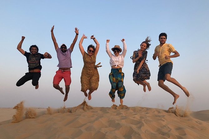 Abu Dhabi Desert Safari with BBQ Dinner & Shows - Dune Bashing, Camel Riding, Sandboarding, and Henna: The Active Core