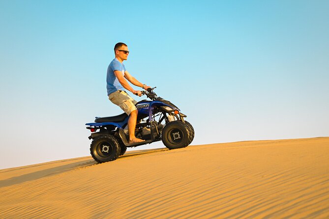 Abu Dhabi Evening Desert Safari - Dune bashing Camel ride and BBQ - Pickup, 4x4 Land Cruisers, and the ride out to the dunes