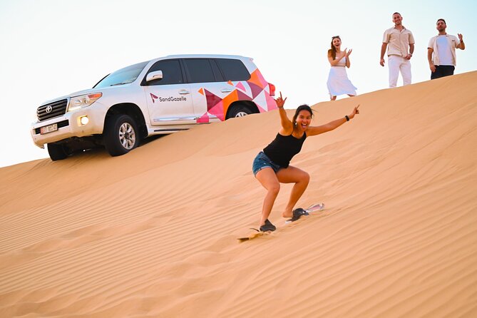 Abu Dhabi Evening Desert Safari - Private car Dune bashing & BBQ - Dune bashing and sand boarding, what to expect from the adrenaline