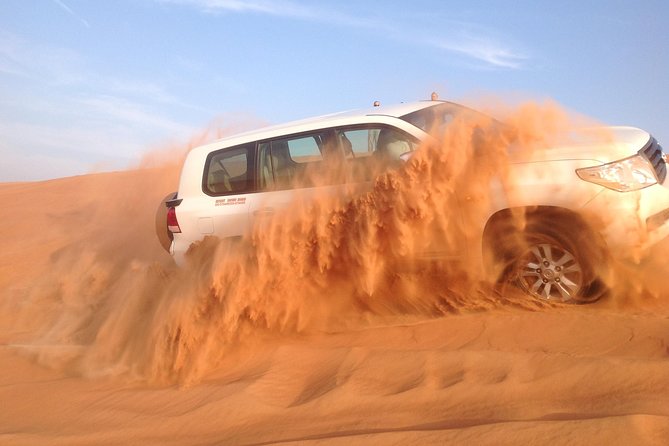 Abu Dhabi Evening Desert Safari with BBQ Dinner and all Camp Activities - Camel Farm Stop: A Short Ride, Big Desert Character