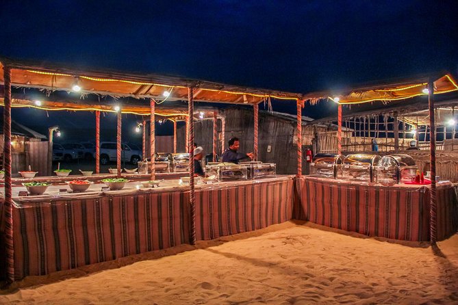 Abu Dhabi Evening Desert Safari with BBQ Dinner and all Camp Activities - Sandboarding Plus Dune Bashing: Your Adrenaline Combo