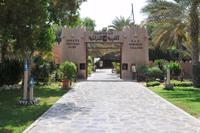 Abu Dhabi Guided City Tour With Ferrari World Tickets From Dubai - Emirates Palace and the Heritage Village: Culture and Glam in the Heat