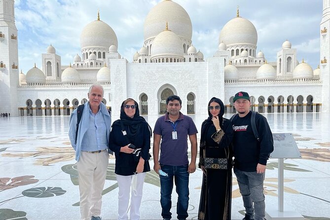 Abu Dhabi Guided City Tour With Ferrari World Tickets From Dubai - Corniche Road and Yas Island Drive: How the Scenery Sets Up Ferrari World