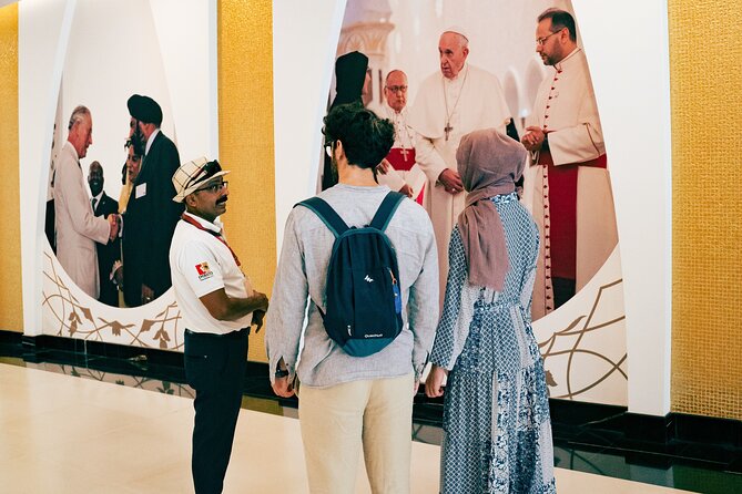 Abu Dhabi Sightseeing Tour: Sheikh Zayed Mosque, Heritage Village & Dates Market - Entering the Sheikh Zayed Grand Mosque center the right way