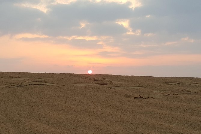 Abu Dhabi: Sunrise Desert Safari Experience - Emirates Tours & Safari Desert Camp: coffee, dates, and Bedouin-style calm
