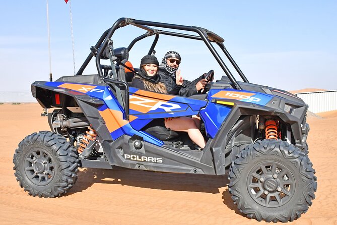 All in one Dubai Desert Safari ATV or Buggy Camelride BBQ Dinner - Lahbab Red Dune: quad bike time, dune bashing, and sandboarding