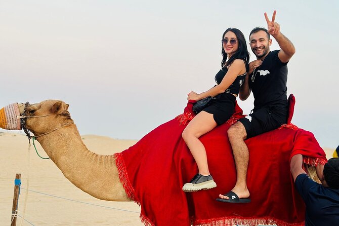 Arabian Desert Safari Abu Dhabi: 6Hour Tour with BBQ & Live Shows - Sandboarding, Camel Moments, Shisha, and Henna: Choose Your Comfort Level
