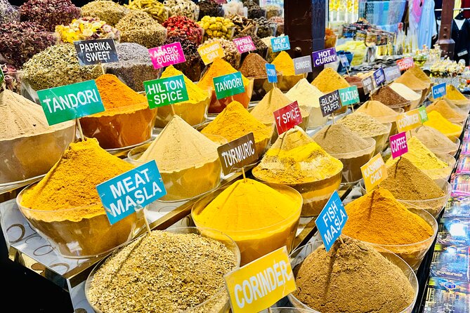 Authentic Old Dubai, Souks, Tastings & local boat Guided Tour - The Old Souk and the Deira spice souk: where shopping is part of the show