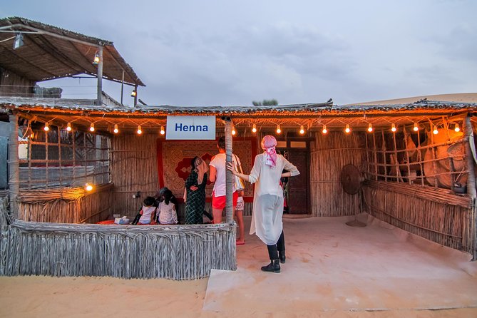 Best of Dubai : Dubai City Tour + Evening Desert Safari with all Activities - Camel ride, sandboarding, and henna art: the active desert hour
