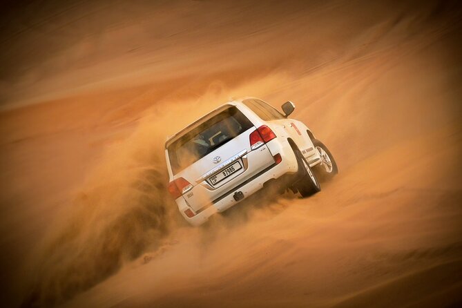 Combo Tour: Grand Mosque Visit & Dubai Desert Safari Experience - Lahbab Bedouin camp: camel ride, henna, sheesha, and BBQ dinner