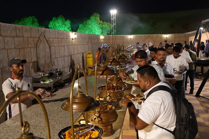 Deluxe Premium Dubai Desert Safari with Camel Ride, and Live Show - The second phase of the evening: welcome drinks, open buffet, and the show lineup
