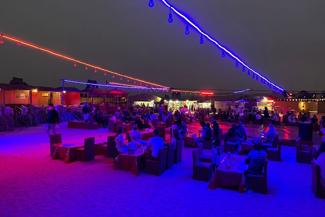 Desert Safari and Sandboarding with Dinner in Dubai - 45 minutes in Big Red Dunes, plus camel and costumes