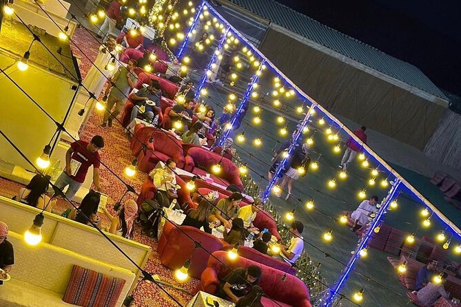Desert Safari BBQ Dinner, Live Shows, ATV Bikes, Sandboarding - Camp entertainment: henna, sheesha, belly dance, Tanoura, and fire