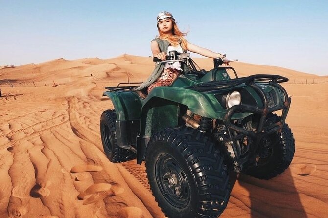 Desert Safari Dubai 25 minutes Quad Bike Free Camel Ride BBQ Dinner - Pickup Timing in Winter and Summer, and What That Means