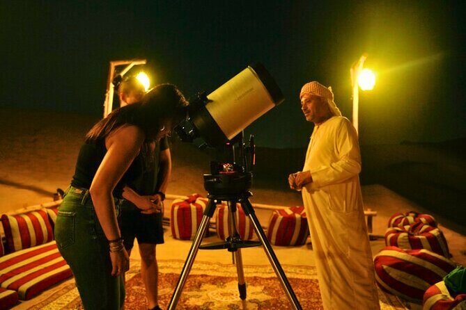 Desert Safari Dubai 30 Mins Quad Bike, Sand Board, Camel Ride BBQ - Entering the desert: tire deflation, red sands, and the sunset photo stop