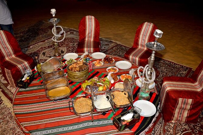 Desert Safari Dubai Red Dunes Safari With Live BBQ Buffet Dinner - Camel Riding, Sandboarding, and the Arabian Welcome
