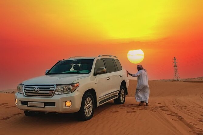 Desert Safari Dubai Tour with Dune Bashing, Camel Ride, & BBQ - From Dubai pickup to the desert mood shift