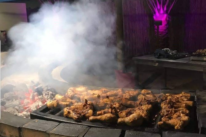 Desert Safari Dubai with Buffet Dinner & 3 live shows - Bedouin-style camp experience: camel, falcon, shisha, henna