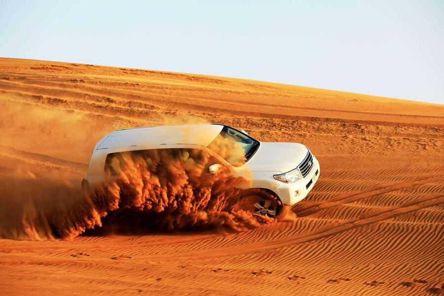 Desert Safari Dubai with Camel Ride, Sandboarding & Dinner - Lahbab Desert quad biking: the fun part, plus the responsibility part
