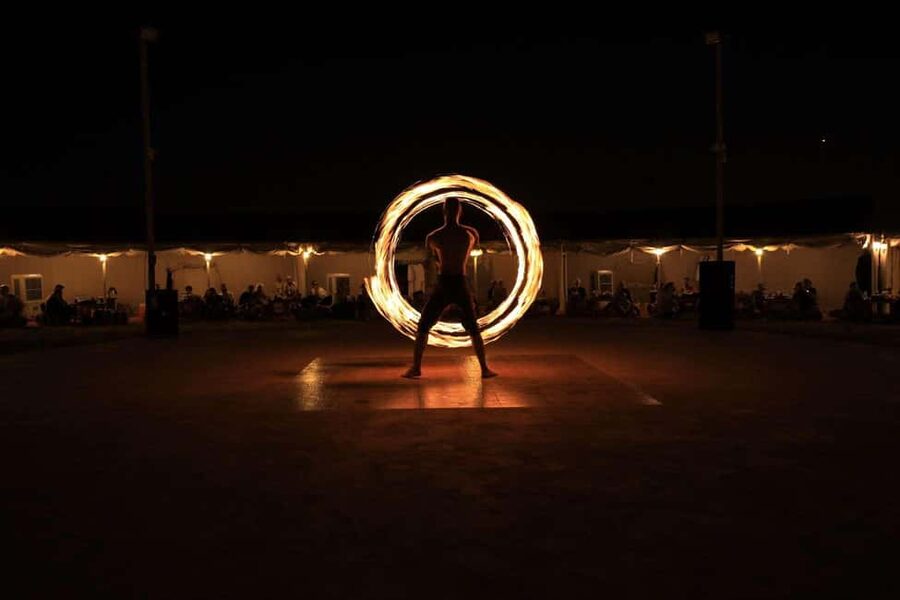 Desert Safari Dubai with Camel Ride, Sandboarding & Dinner - The camp dinner and shows: BBQ, henna, hookah area, and a full night program