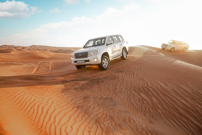 Desert Safari Dubai with Dune Bashing, Sandboarding, Camel Ride, 5 Shows, Dinner - Camel Ride and Bedouin-Style Touches: The Slower Side of the Night