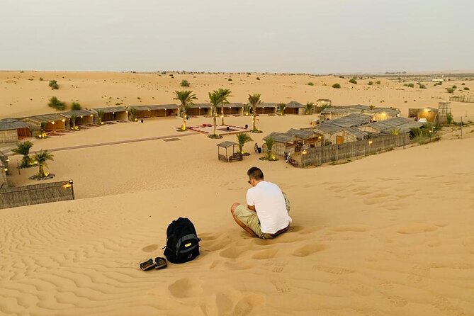 Desert Safari Experience with Dune Bashing and Dinner in Dubai - Camel Ride and Sand Boarding, Hands-On Fun Under the Dunes