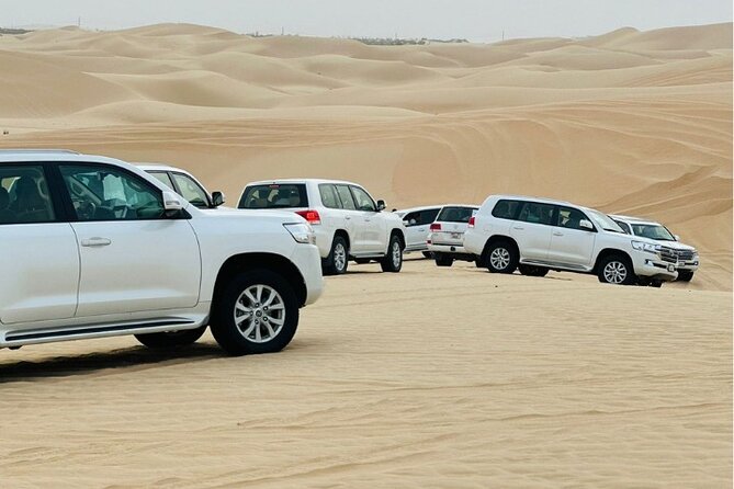 Desert Safari In Dubai With 4x4 Pick & Drop & Live Show - Quad Biking, Sandboarding, and Camel Ride: Where the Timing Matters