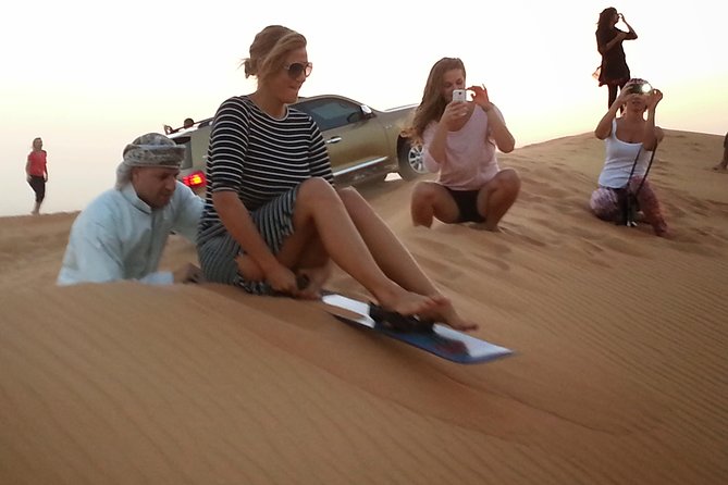 Desert Safari Tour - FULL PROGRAM with Dinner Show and more... - Al Madam Middle of the Desert: Sunset Photos, Camels, Sandboarding