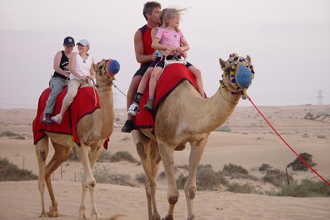 Desert Safari Tour with 30 Minutes Quad bike Ride - Desert Camp Evening: Camel Ride, Henna, Sheesha, and Photos