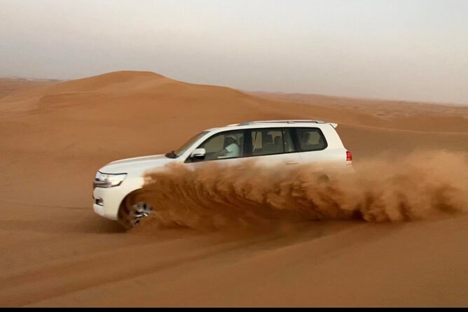 Desert Safari Tour with Camel Ride and BBQ Dinner in VIP Camp - A 6-and-a-half-hour Dubai desert circuit with pickup and a VIP-style camp