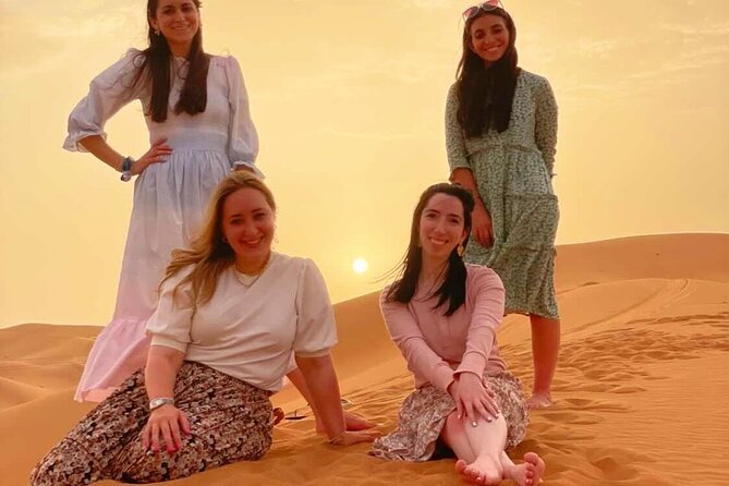Desert Safari With BBQ Dinner, Quad Bike & Camel Ride from Dubai - Henna, Belly Dancing, Falcon Photos, and Fire Shows Under the Stars