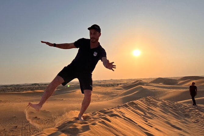 Desert Safari with Dune Bashing and Camel Ride plus Sand Boarding - Henna tattoos, UAE national costume, and falcon photos