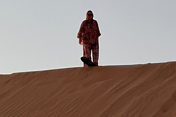 Desert Safari with Dune Bashing and Camel Ride plus Sand Boarding - Camel ride and sand boarding: fun, not complicated