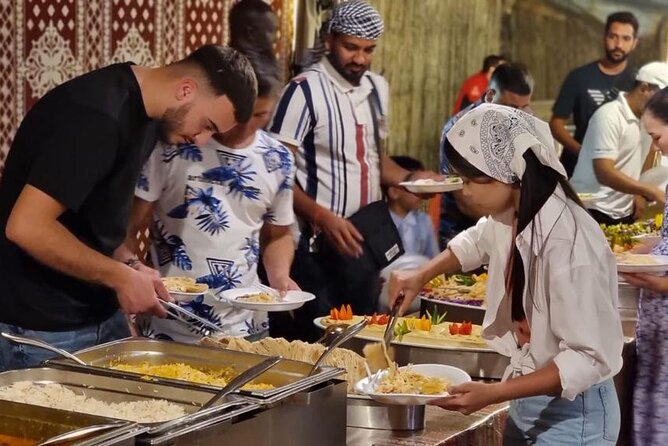 Desert Safari with Dune Bashing and Dinner In Dubai - Henna, Painting, Camel Riding, and Bedouin Touches