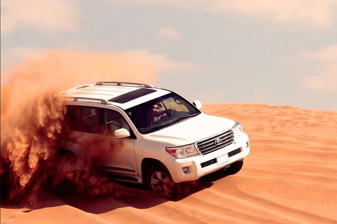 Desert Safari with Quad Bike, 4x4 Dune Bashing and Camel Ride - How this evening safari packs quad bikes, dunes, and dinner into 6 hours