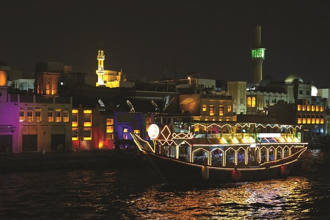 Dhow Cruise Dinner on Dubai Creek - Views from the open-air upper deck: old Dubai at night