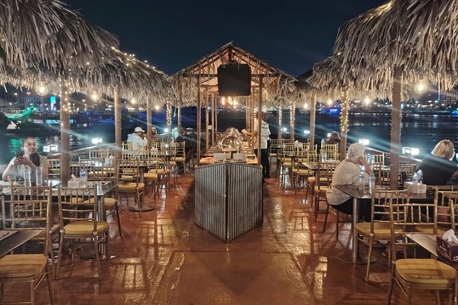 Dhow Cruise Dubai with Buffet Dinner, Dance & Horse Show - A wooden dhow cruise with dinner and shows, all in one ticket